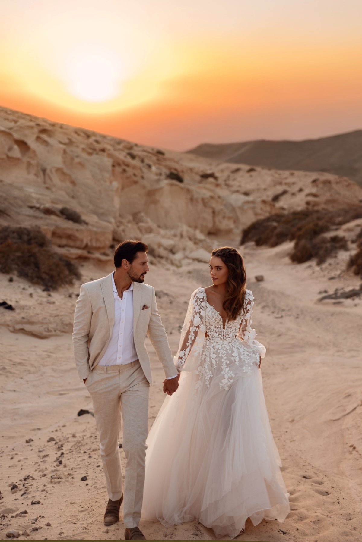 Alia in motion, with an A-line tulle skirt moving as the bride walks