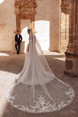 The Ariella cathedral bridal veil with lace edging delivers a romantic and graceful finish for a classic wedding style.