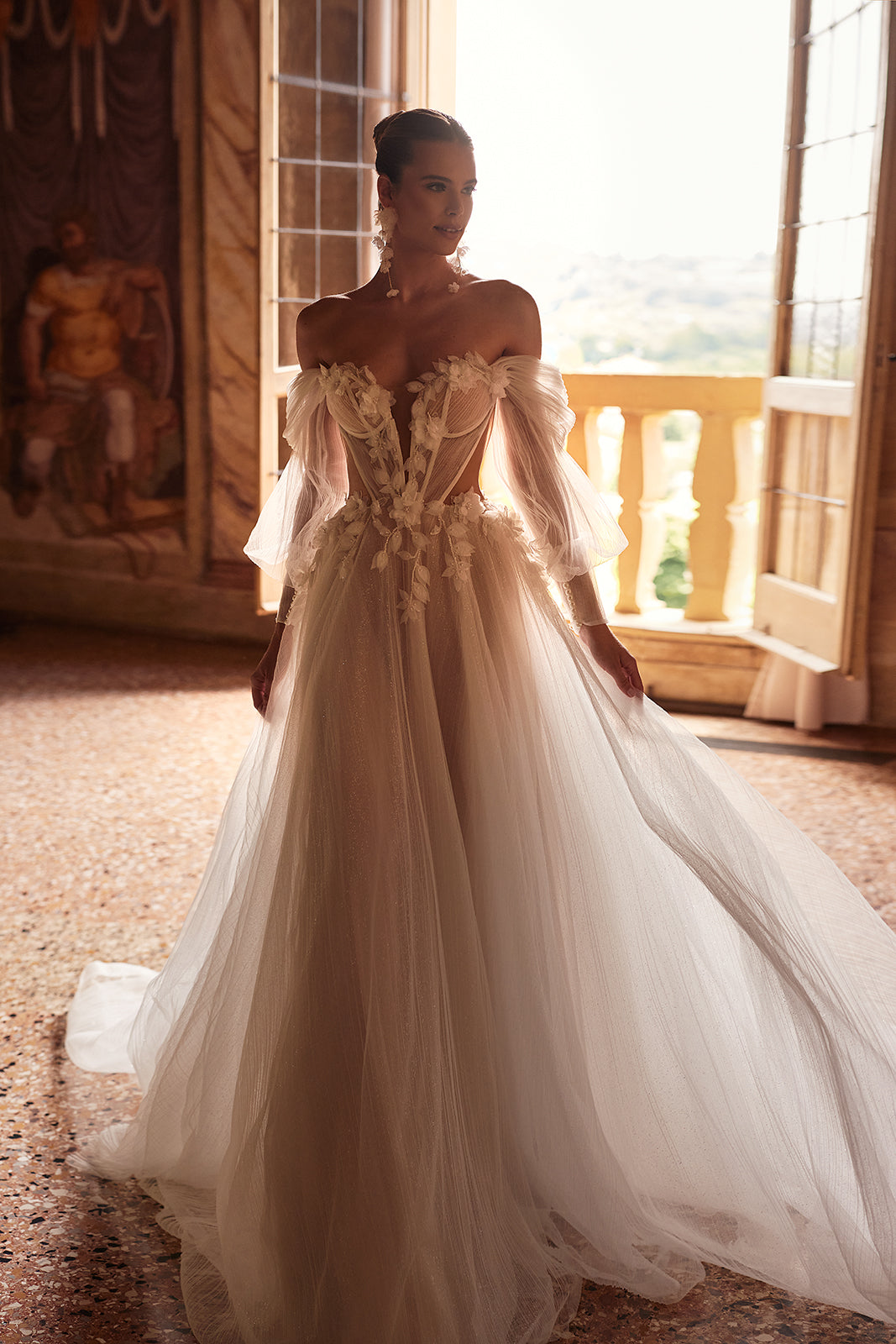 Front view of Avalon A-line wedding dress, with 3D flowers and off-the-shoulder sleeves