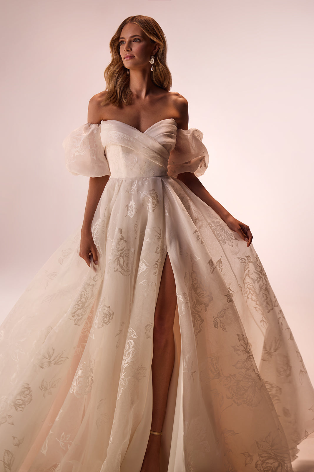 Berta organza wedding dress from the front, with a floral pattern and detachable puff sleeves