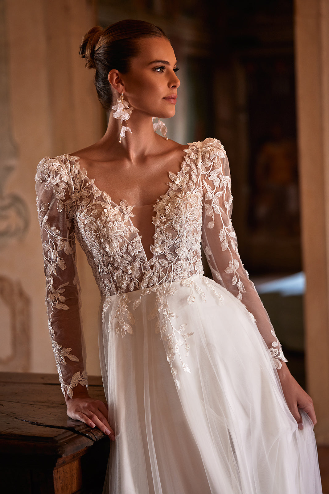 Lace wedding dress with long sleeves Calista Cristal from DAMA Couture (close up picture)