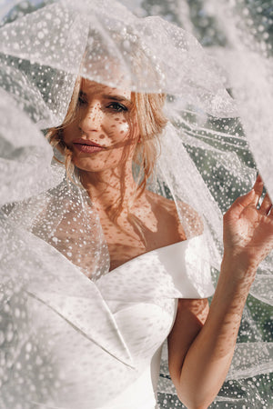 Cathedral snowdrop veil – cathedral wedding veil in motion.