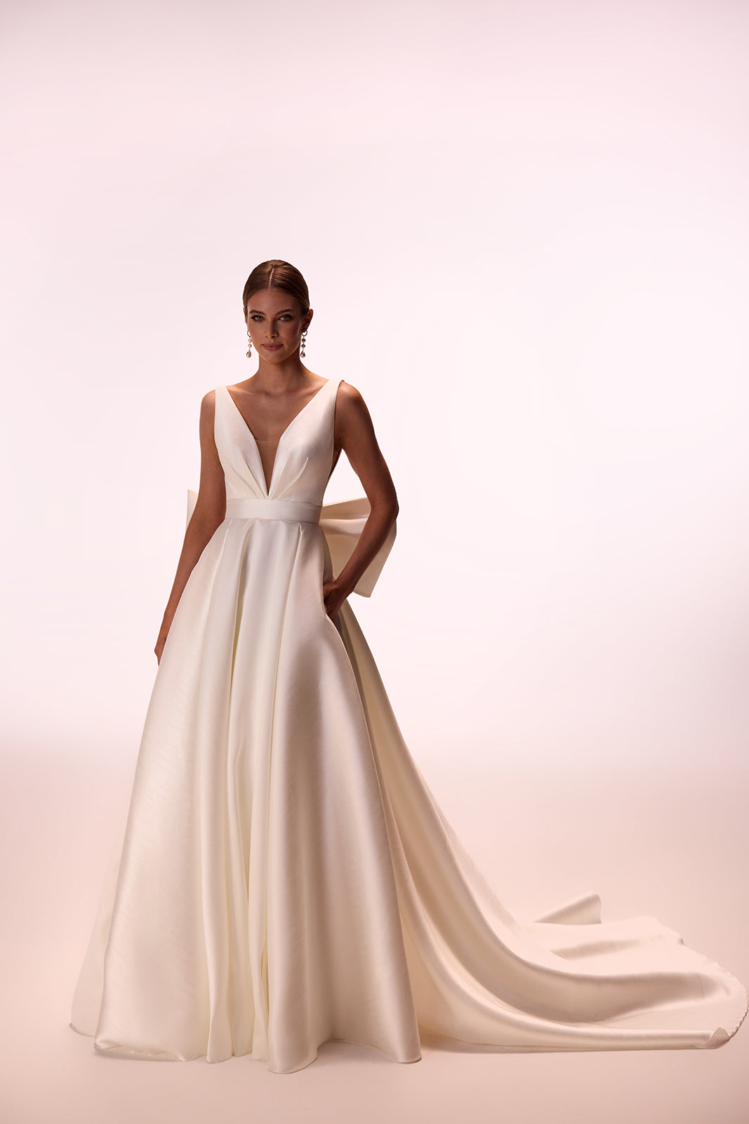 Front studio view of Margo A-line wedding dress, with plain satin and a V neckline