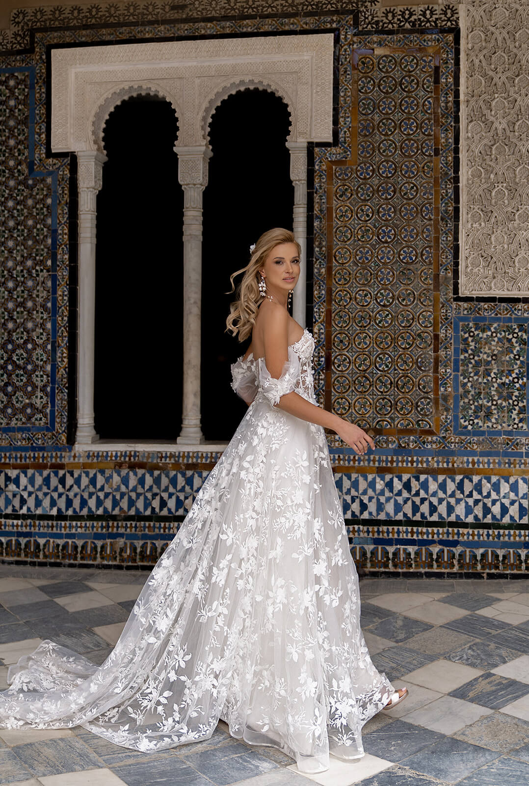 Sarah – wedding dress by DAMA Couture.