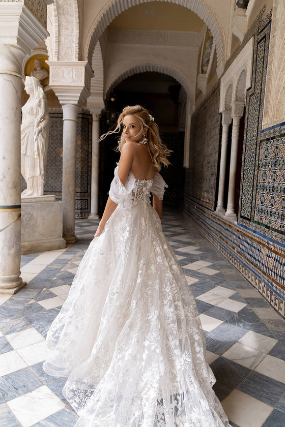Sarah – wedding dress by DAMA Couture.