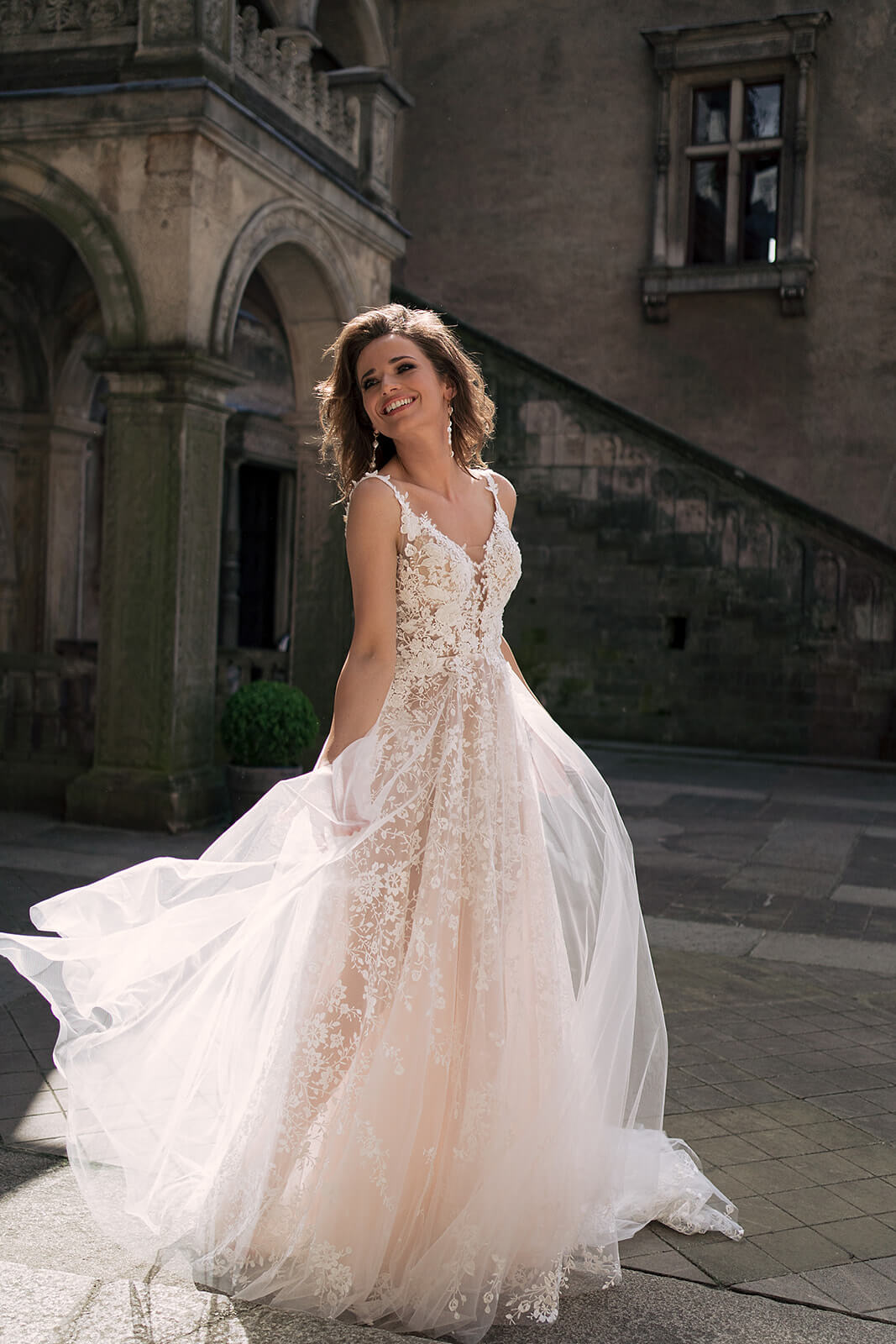 Gilly – wedding dress by DAMA Couture.