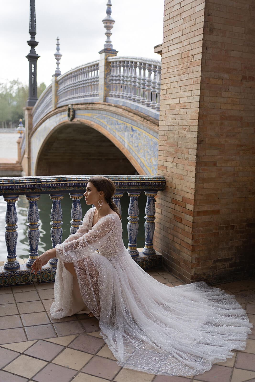 Sheer tulle sleeves of Suri, shown close up