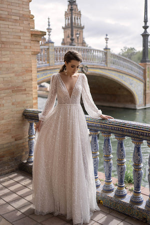 Suri – close-up of the wedding dress.
