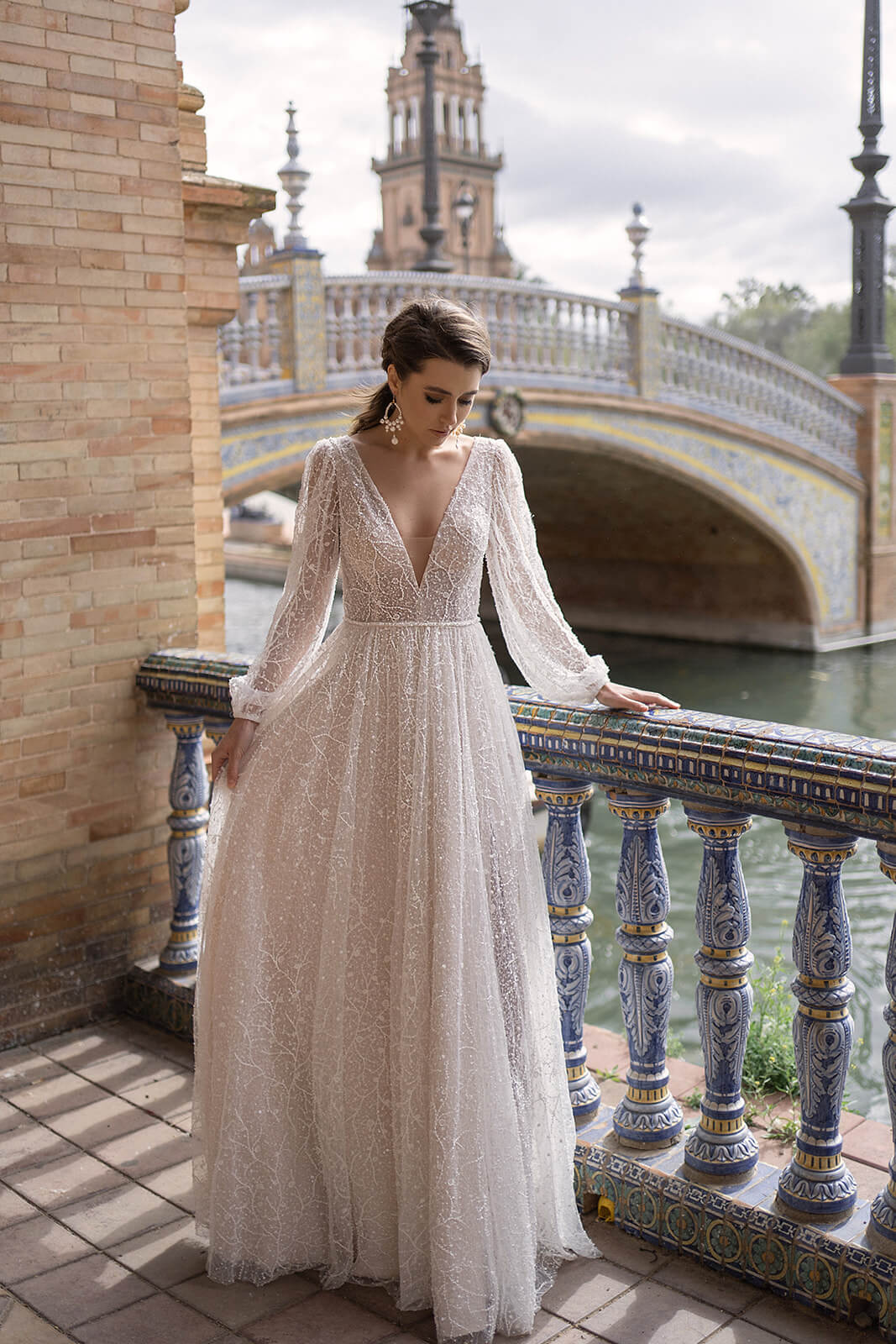 Suri – close-up of the wedding dress.