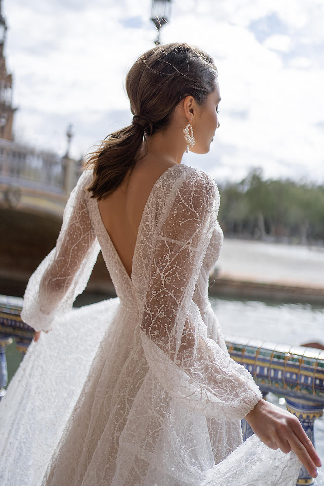 Raised floral motifs on the Suri corset above an embroidered belt, shown in detail