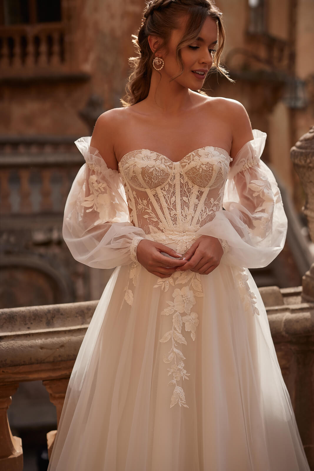 Front detail of Hermiona wedding dress, showing visible boning and leaf lace on the bodice