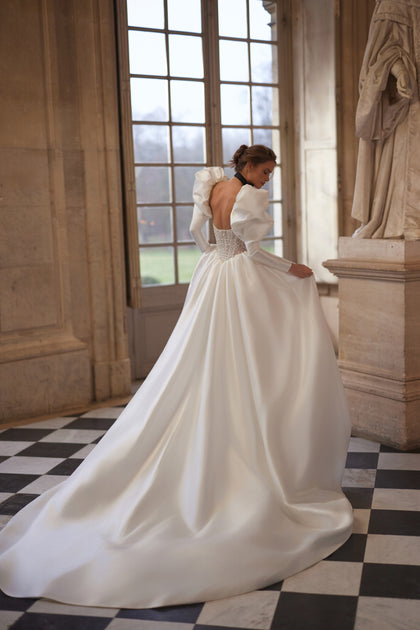 Aliette wedding dress from the Something Blue 2027 collection – a crystal-embellished corset and voluminous sleeves.