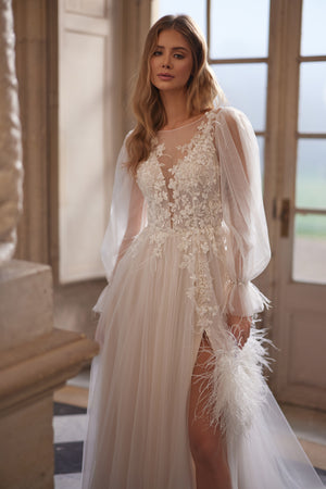 Blair wedding dress – A-line bridal gown with a sheer floral bodice and airy voluminous sleeves.
