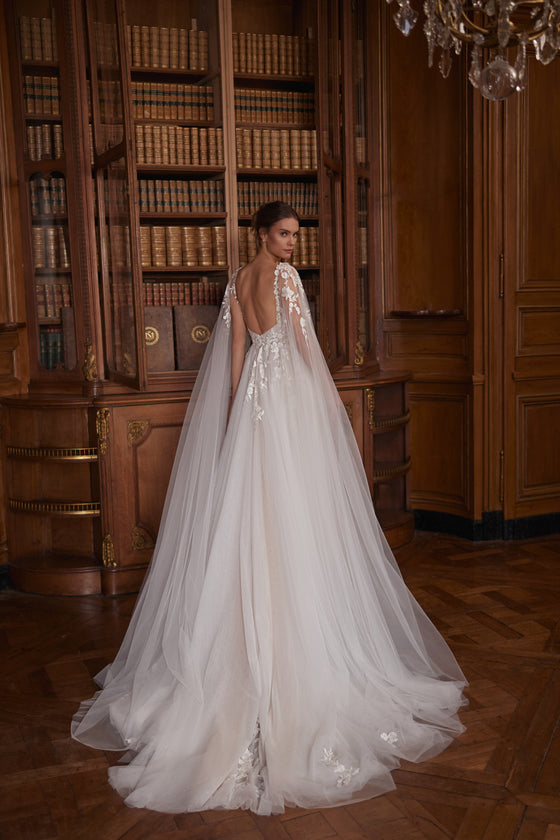 Veloria wedding dress – A-line bridal gown with a V-neckline, floral straps and layered tulle skirt.