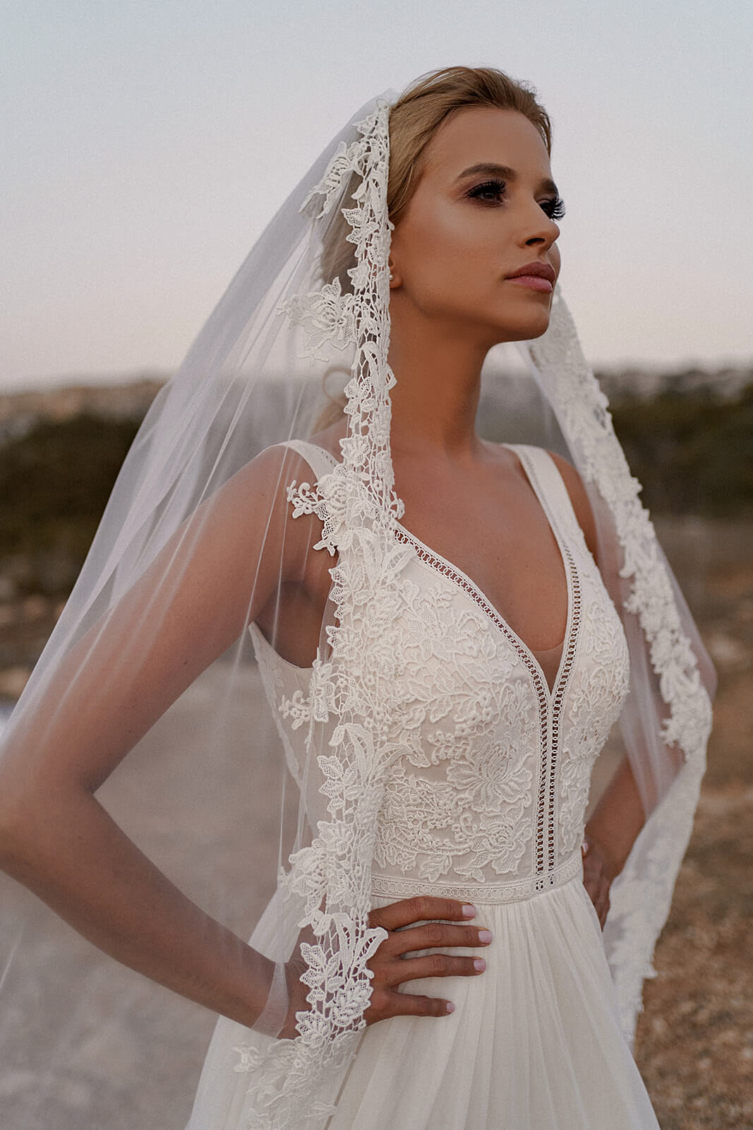 Cathedral veil with lace showing tulle and the lace border along its full length