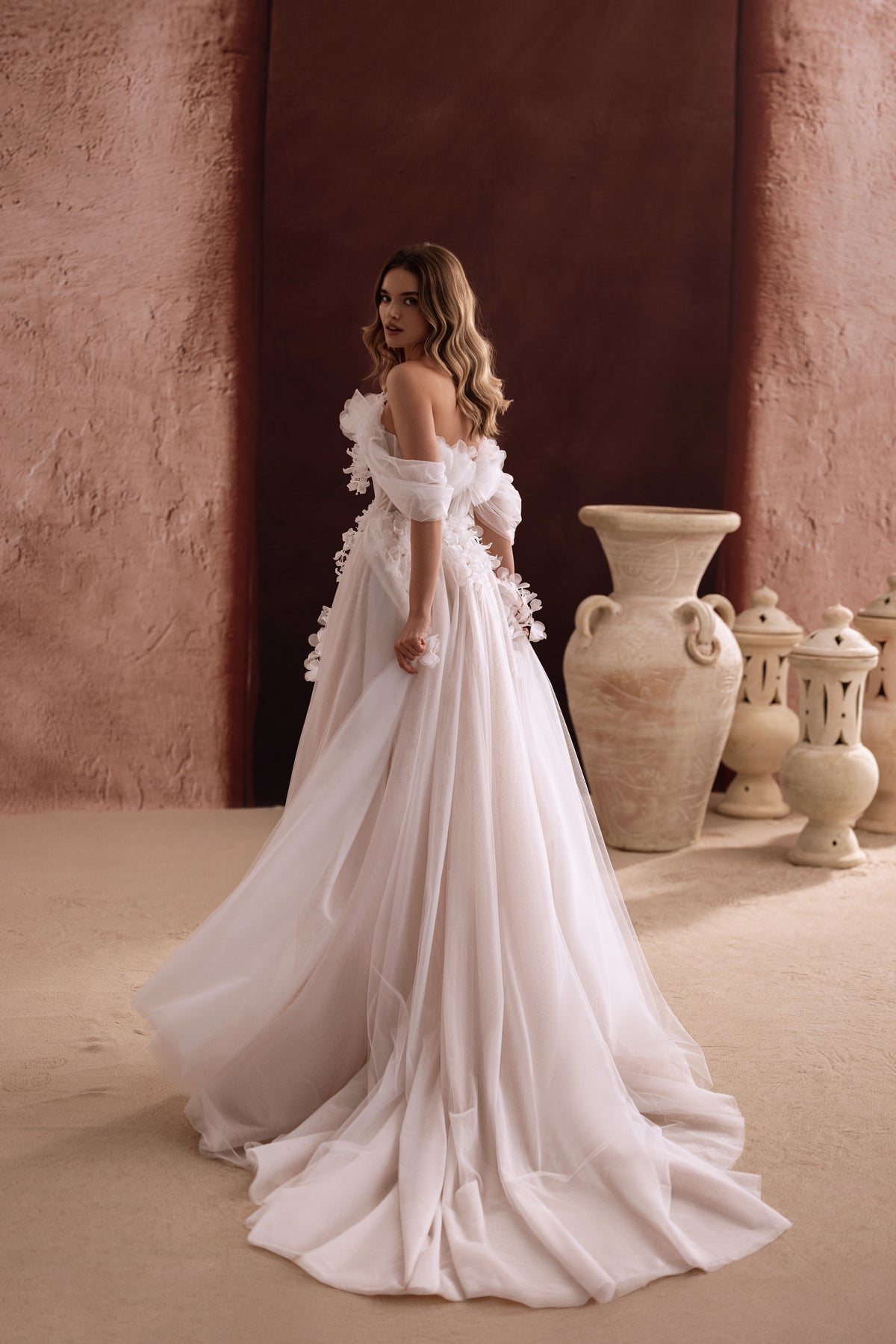 Bella wedding dress with off-the-shoulder sleeves and a long tulle train