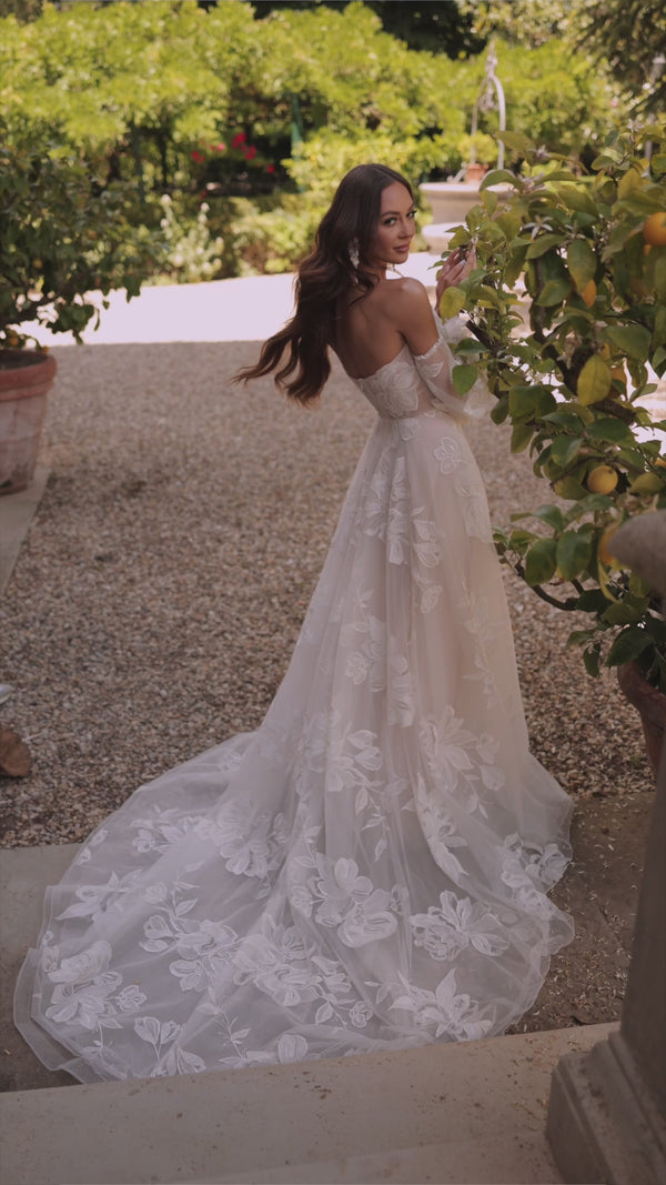 Modern wedding dress with lace Caesaria from DAMA Couture (campaign video)