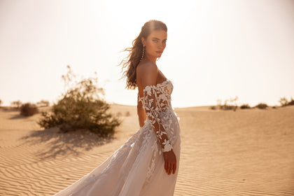 The Tamara bridal dress with sweetheart bodice and floral lace appliqué captures a perfect mix of classic and contemporary style.